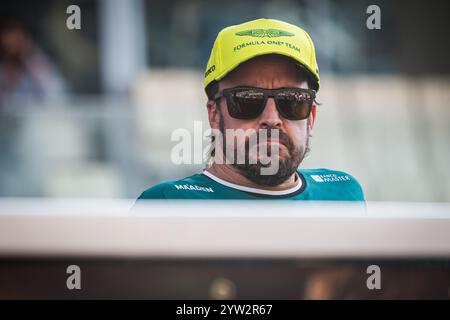 Abu Dhabi, United Arab Emirates. 08th Dec, 2024. Aston Martin Aramco F1 Team's Spanish driver Fernando Alonso is seen during the drivers parade ahead of the Abu Dhabi F1 Grand Prix race at the Yas Marina Circuit. (Photo by Andreja Cencic/SOPA Images/Sipa USA) Credit: Sipa USA/Alamy Live News Stock Photo