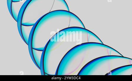Illustration of abstract close-up of a sequence of overlapping transparent circles with iridescent edges against a blue background Stock Photo
