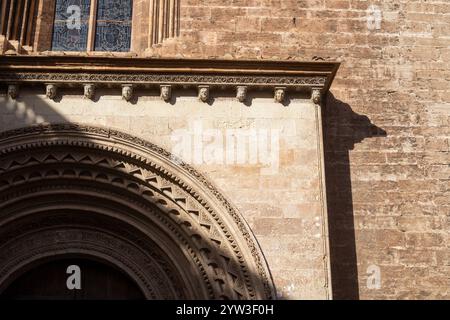 DETAIL OF THE ROMANIC DOOR OF THE CATHEDRAL OF VALENCIA Stock Photo