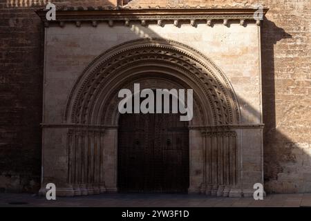 DETAIL OF THE ROMANIC DOOR OF THE CATHEDRAL OF VALENCIA Stock Photo