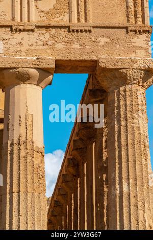 Tourist Exploring Ancient Greek Ruins During Daytime Under Bright Clear ...
