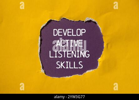 Develop active listening skills message written on round orange sticker ...