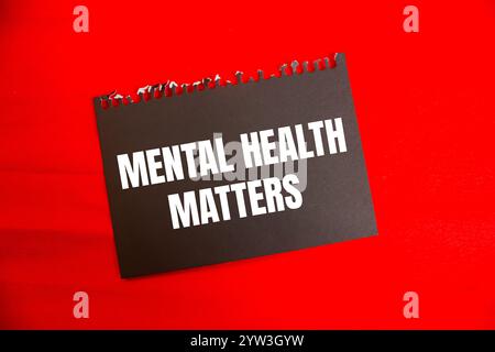 Mental health matters message written on ripped torn paper piece with ...
