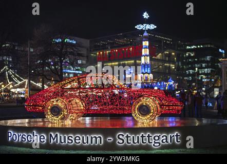 Night shot, Christmas market, Christmas lights, illumination, with Porsche 911, Porsche Museum lettering, landmark, Christmas pyramid, art museum, Cub Stock Photo