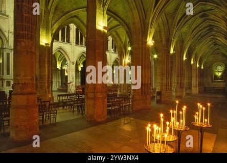 Candles in front of Polish painting of Virgin Mary of Ostra Brama, at Saint Séverin Church ambulatory in Paris, France Stock Photo