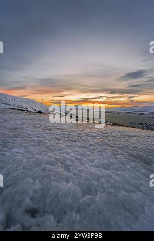 Winter view from Mount Storsteinen to the strait and the southern tip of Tromso at sunset, Troms, Norway, Europe Stock Photo