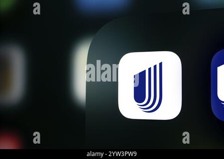 Dhaka, Bangladesh- 06 Dec 2024: A close up of an iPhone screen displaying the UnitedHealthcare app icon. Stock Photo