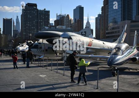 Visitors on the flight deck of the Intrepid Sea, Air & Space Museum in