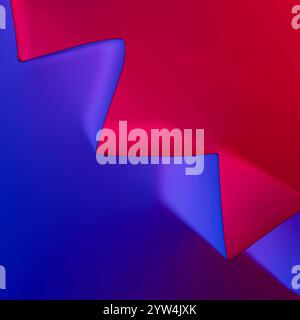 Folded paper illuminated by blue and red coloured lights to create a dramatic, abstract look Stock Photo