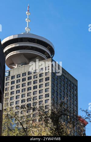 Downtown Vancouver city skyline. View of the Vancouver Lookout tower against blue sky from street level. Modern architectural background. Travel photo Stock Photo