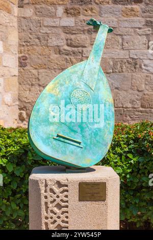A bronze sculpture by Teymur Rustamov of a traditional Azerbaijani string instrument named ud (2010) in the Old City of Baku, Azerbaijan Stock Photo