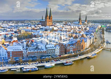 Aerial view over the river Trave and church towers in the old town of the Hanseatic City of Lübeck in winter, Schleswig-Holstein, Germany Stock Photo