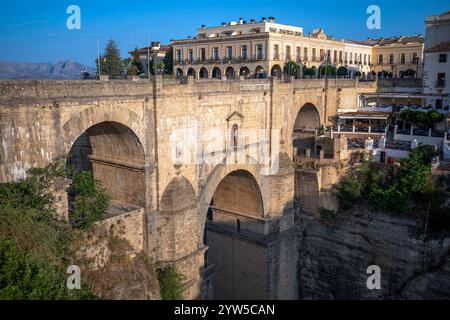 Panoramic view of the monumental city of Ronda, Malaga, Spain, with the impressive new bridge that connects the new and old part of the city Stock Photo