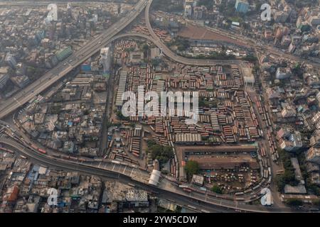 An aerial view of Dhaka, the capital of Bangladesh, enveloped in fog, offering a serene yet hazy glimpse of the bustling city. Stock Photo