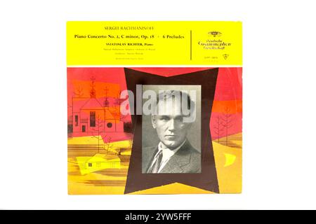 Vintage Rachmaninoff piano concerto No.2 vinyl record cover with artistic design and a black-and-white photograph deutsche gramophon label Stock Photo