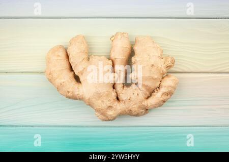 ginger on wood background top view Stock Photo