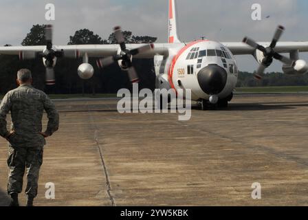 JACKSONVILLE, Fla. - Brig. Gen. Joseph G. Balskus, commander, Florida Air National Guard, St. Augustine, Fla., watches a Coast Guard C-130 Hercules ai Stock Photo