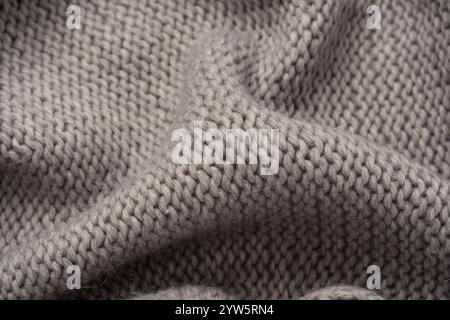 Grey wool sweater texture as a background. Top view. Stock Photo