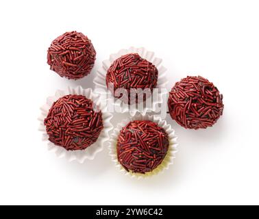 Delicious chocolate truffles in paper cups on white background Stock ...
