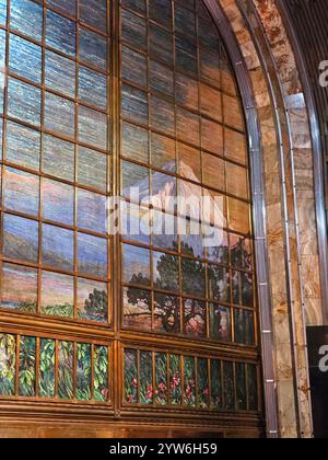 Mexico City, Mexico - Jul 12 2024: Interior of the Main Hall of the Palace of Fine Arts with a curtain made with pieces of decorated glass Stock Photo