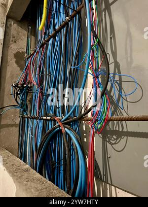 Electrical wires and cables being installed at a construction site ...