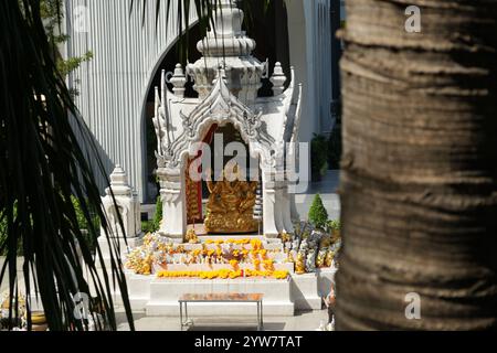Bangkok, Thailand - November 26, 2024: Ganesha Phra Phikanet and Trimurti shrines in bangkok, so many thais and overseas visitors who come to pray for Stock Photo