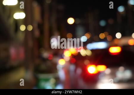 Blurred photo of the car on the road with bokeh background Stock Photo