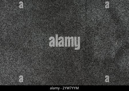 Black color abstract patterns of fake fur for design element. Close up view photography of shaded dark color surface level faux fur fabric, free copy Stock Photo