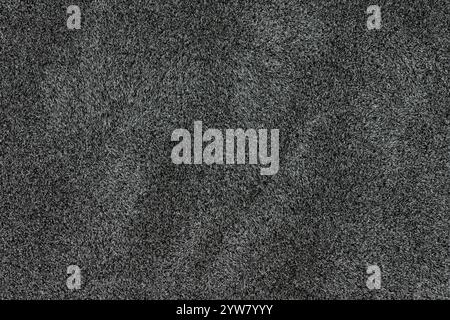 Black color abstract fake fur pattern for design element. Closeup view photography of shade dark color surface level faux fur material, background tex Stock Photo