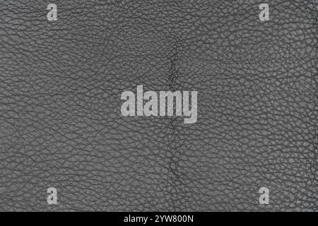 Dark gray color abstract artificial leather pattern for background. Closeup view photography of shade light black color surface level artificial leath Stock Photo