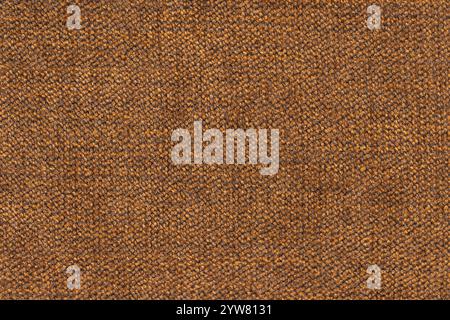 Brown color woven hand abstract cloth pattern for background, free copy space for design. Close-up of brownish colour surface level woven hand fabric Stock Photo