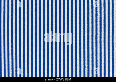 White and blue lines, striped abstract fabric texture background. Closeup image of surface level fabric material, colored background texture of cloth Stock Photo