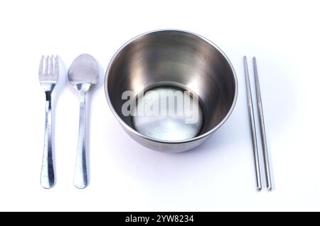 Stainless Steel Bowl Set With Utensils on White Background for Dining Stock Photo