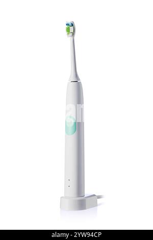 Modern electric toothbrush for brighter, healthier teeth, oral cleaning tooth brush isolated on white background Stock Photo
