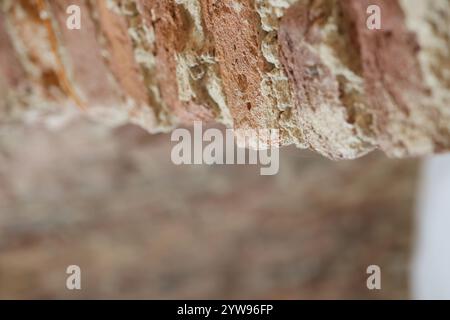 A CloseUp View of a Weathered Brick Texture and Structure Displaying Unique Features Stock Photo