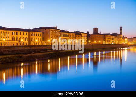 Pisa, Italy skyline on the Arno River at blue hour. Stock Photo