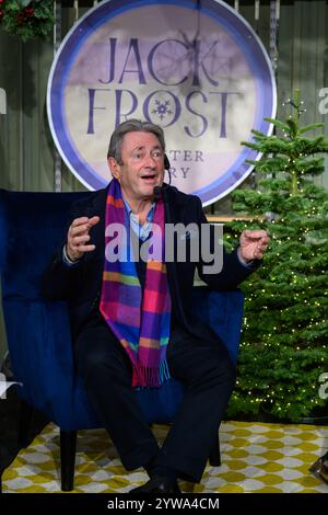 Wisley, UK, 9th December 2024, Gardener, writer and RHS Ambassador Alan Titchmarsh and composer Debbie Wiseman celebrate the unique musical collaboration between ‘Jack Frost – A Winter Story’ and RHS Garden Wisley’s dazzling festive illuminations – RHS Glow., Andrew Lalchan Photography/Alamy Live News Stock Photo