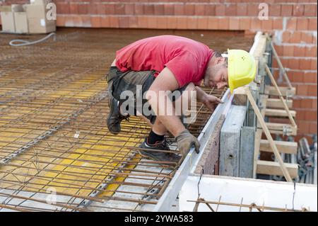 Bauarbeiter am Bau, Bauarbeiter auf dem Baugelaende Stock Photo