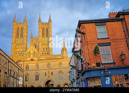 UK, Lincolnshire, Lincoln Cathedral West Front and Magna Carta Pub from Castle Square. Stock Photo