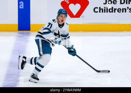 San Jose Sharks' Macklin Celebrini, second from left, celebrates his