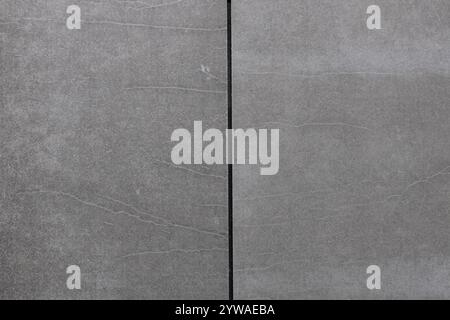Close-Up of Gray Stone Tile with Natural Cracks Stock Photo