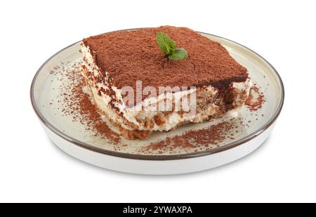 Piece of tasty tiramisu with fresh mint isolated on white Stock Photo