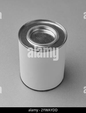 silver tin can with lid closed and blank label isolated on gray background, metal container mock-up template Stock Photo