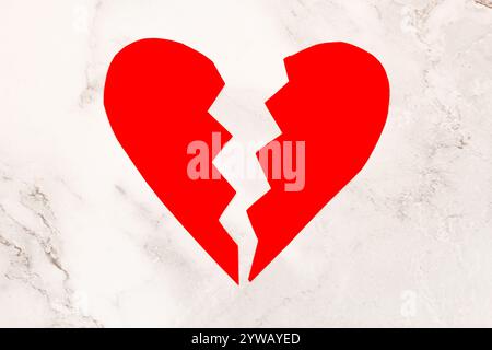 broken red paper heart isolated, concept Stock Photo