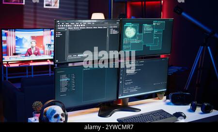 Lines of code displayed on computer monitors used by cybercriminal stealing sensitive information. Virus scripts running on PC infecting network systems, breaking passwords Stock Photo