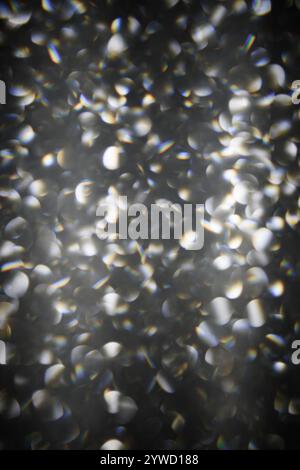 Shining backgrounds. Holiday backgrounds. Silver bokeh glitter. Blurry background. Silver bokeh color background. Bokeh glitter background. Silver sno Stock Photo