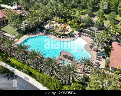 Aerial video of recreational facilities with pool in private ...
