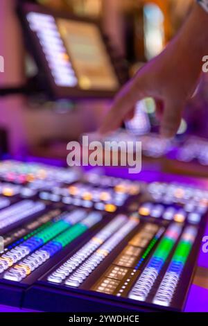 Switchboard for live broadcast production. Video mixer use. Video switch of Television Broadcast, working with video and audio mixer, control broadcasts in recording studio. Mix board, selective focus Stock Photo