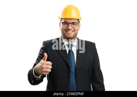 Friendly male contractor or engineer wearing business clothing smiling making like gesture using thumb up isolated on white studio background Stock Photo