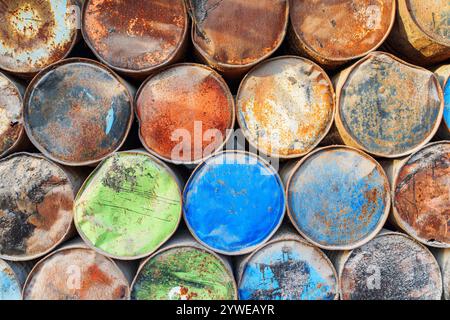 Scenic view of old metal barrels in a port Stock Photo